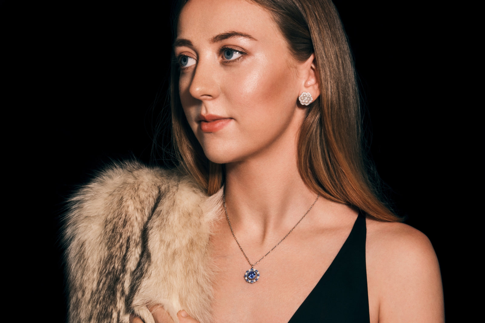 One & Sixteen A sapphire and diamond pendant