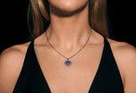 One & Sixteen A sapphire and diamond pendant