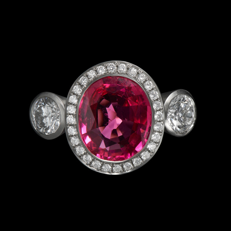 An exceptional pink spinel & diamond cluster ring