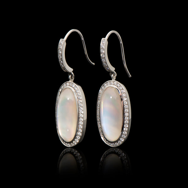 A unique pair of moonstone & diamond drop earrings