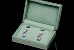 A pair of charming lilac sapphire & diamond drop earrings