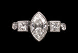 A navette, carree & brilliant cut diamond ring