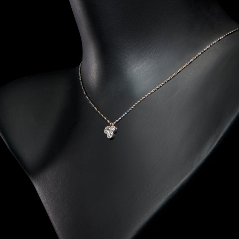A diamond trefoil pendant