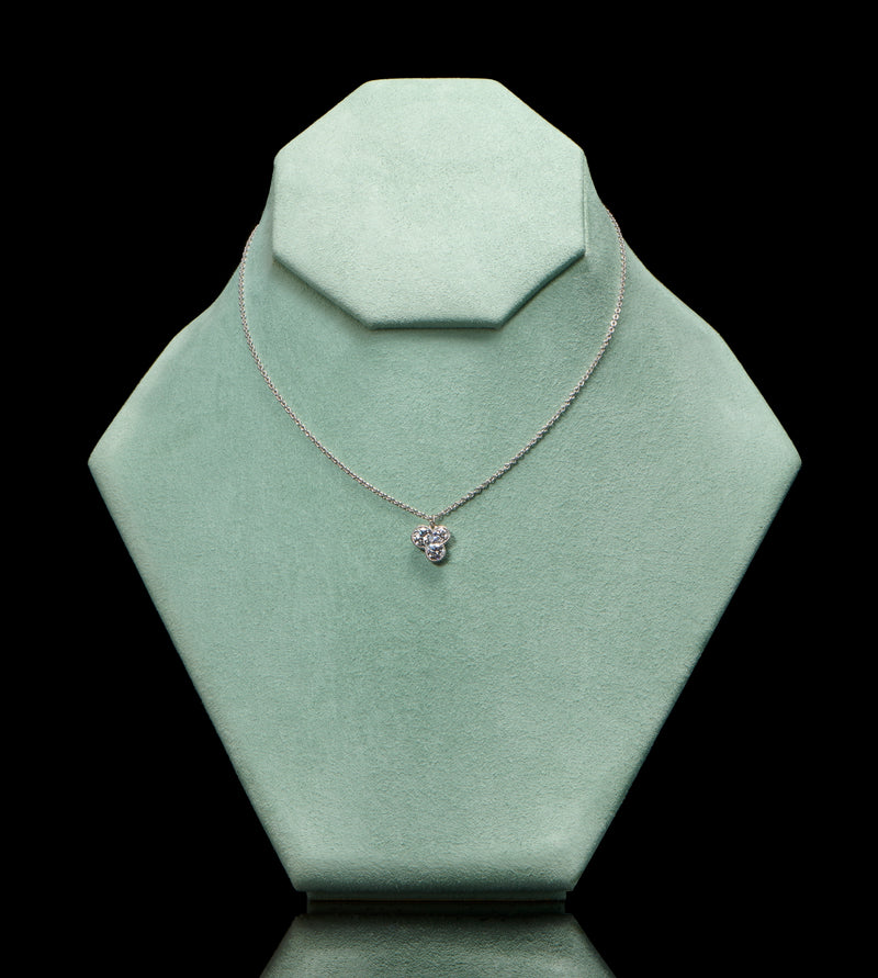 A diamond trefoil pendant