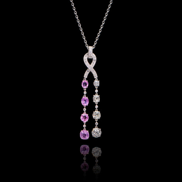 A twin cascade pink sapphire & diamond pendant