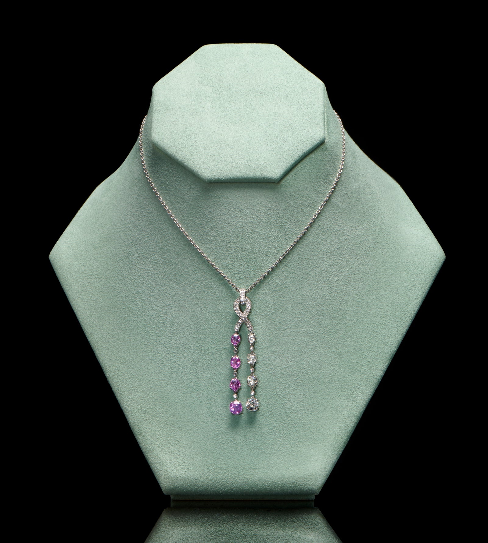 A twin cascade pink sapphire & diamond pendant