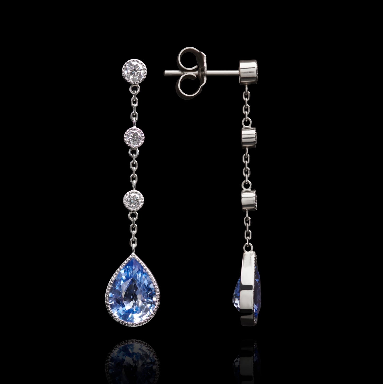 A unique pair of sapphire & diamond drop earrings