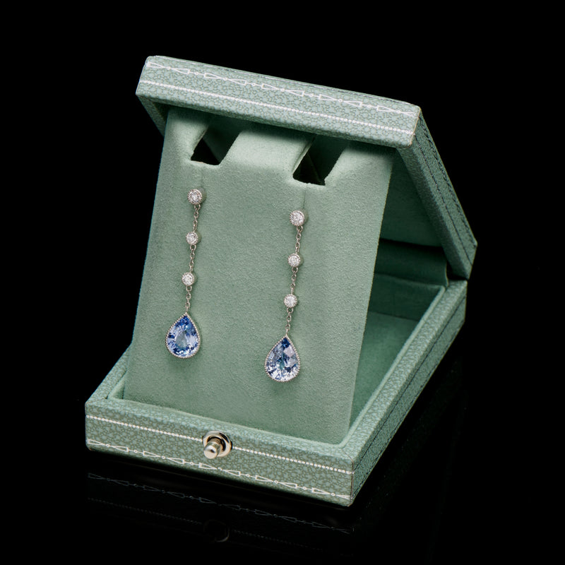A unique pair of sapphire & diamond drop earrings