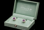 A unique pair of violet sapphire & diamond cluster earrings