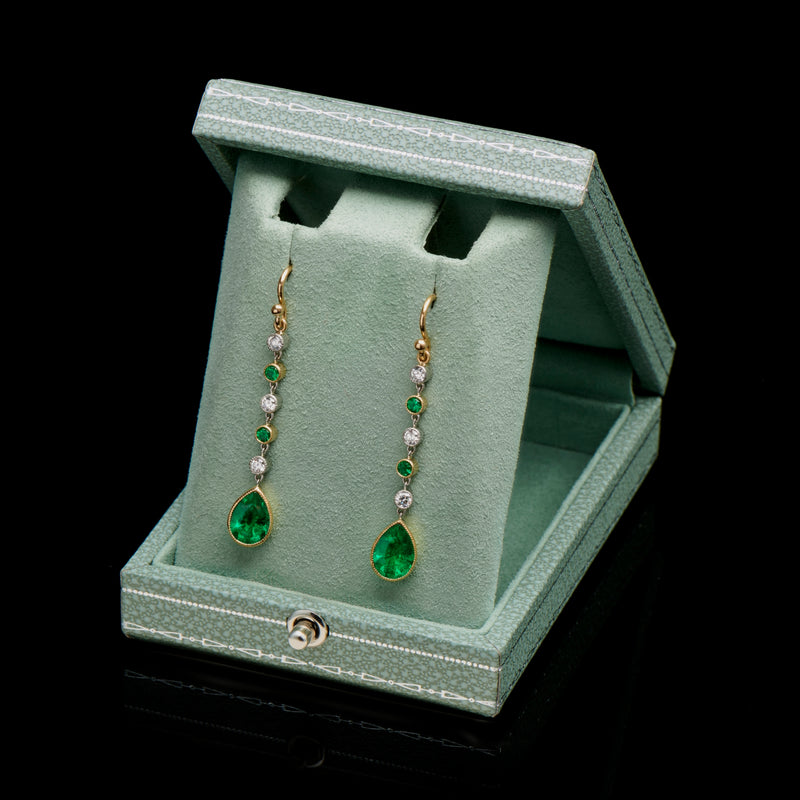 A pair of emerald & diamond drop earrings