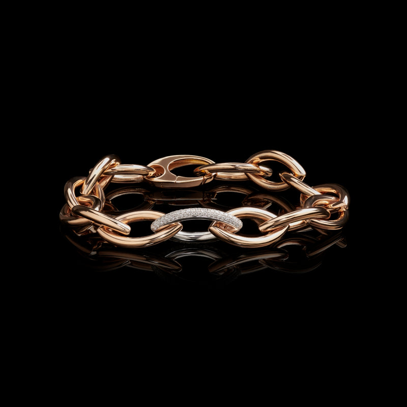 An 18 carat rose gold navette link bracelet with diamond set link
