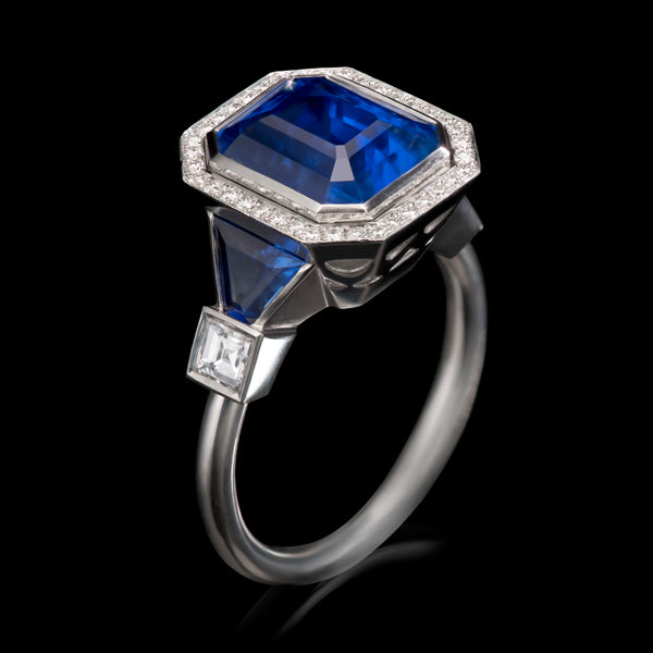 A sapphire & diamond cluster ring