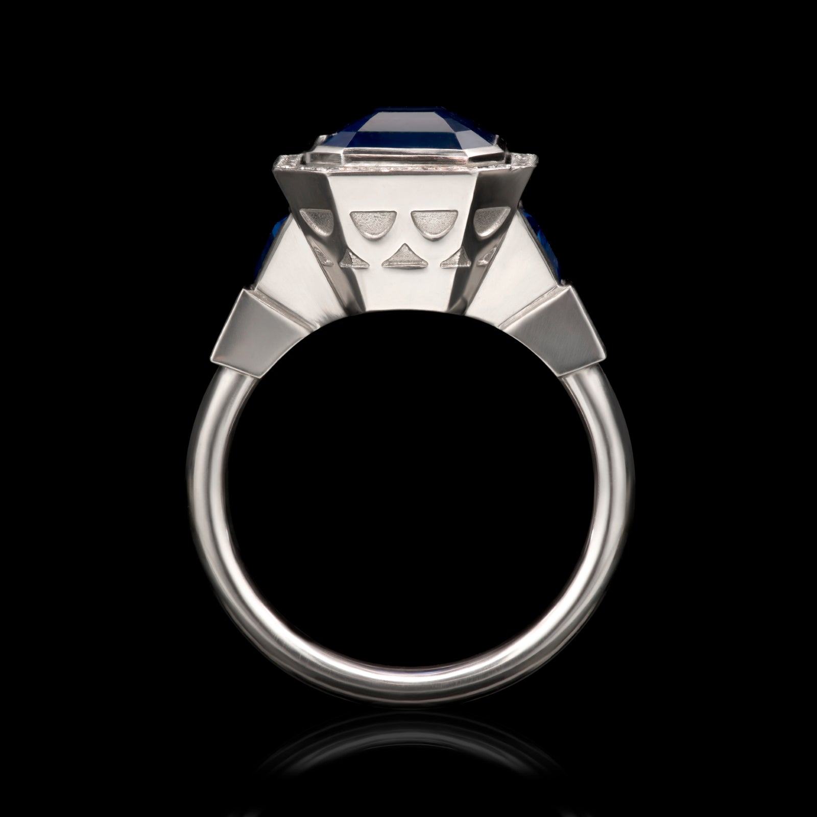 A sapphire & diamond cluster ring