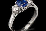 A fine quality sapphire & diamond three stone ring