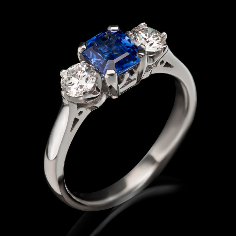 A fine quality sapphire & diamond three stone ring