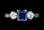 A fine quality sapphire & diamond three stone ring