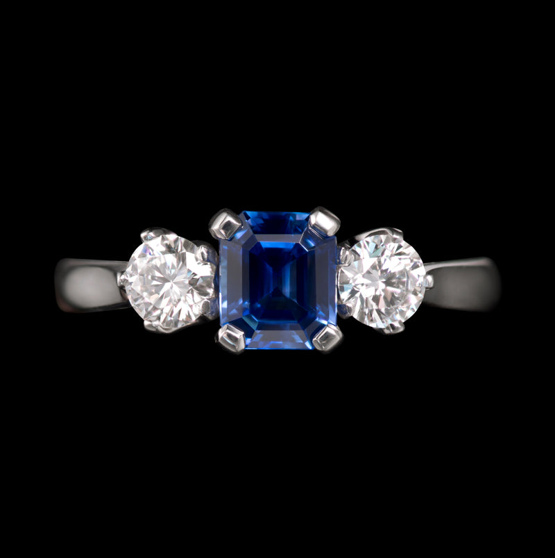 A fine quality sapphire & diamond three stone ring