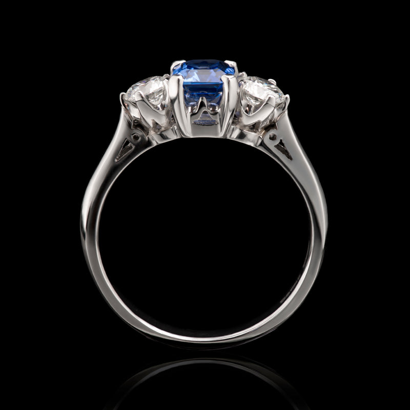 A fine quality sapphire & diamond three stone ring