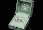 A fine quality sapphire & diamond three stone ring