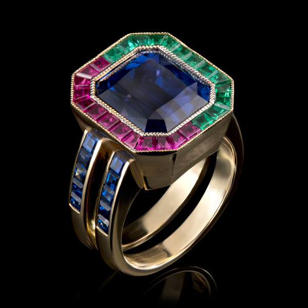 A Unique & Individual colour change Sapphire Ring with Emerald & Ruby surround.