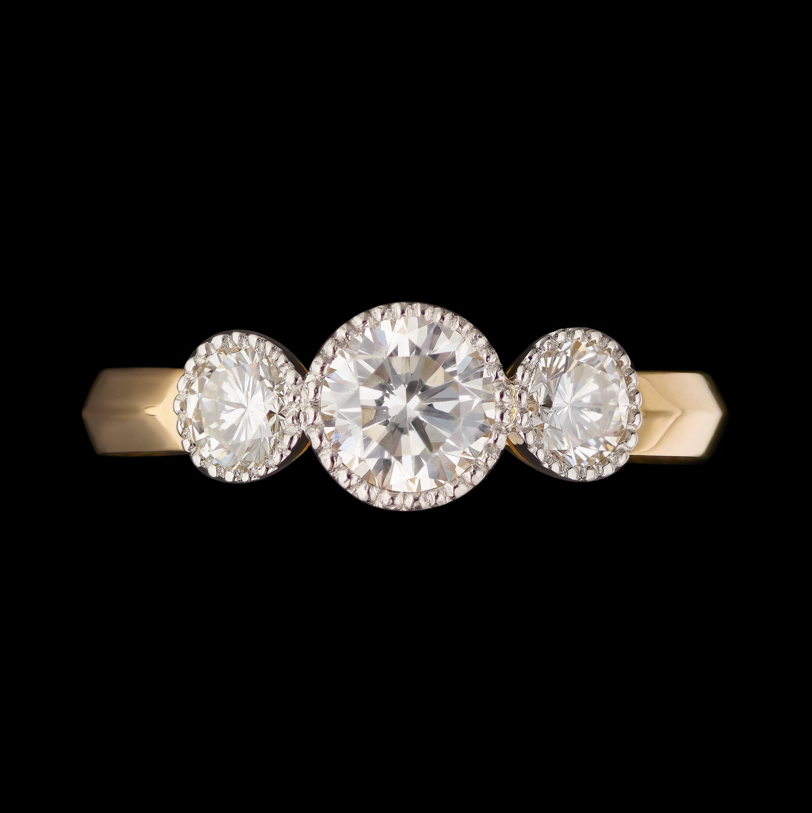 A Unique Classic Diamond Three Stone Ring