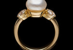 A Unique Natural Pearl & Diamond Three stone Ring