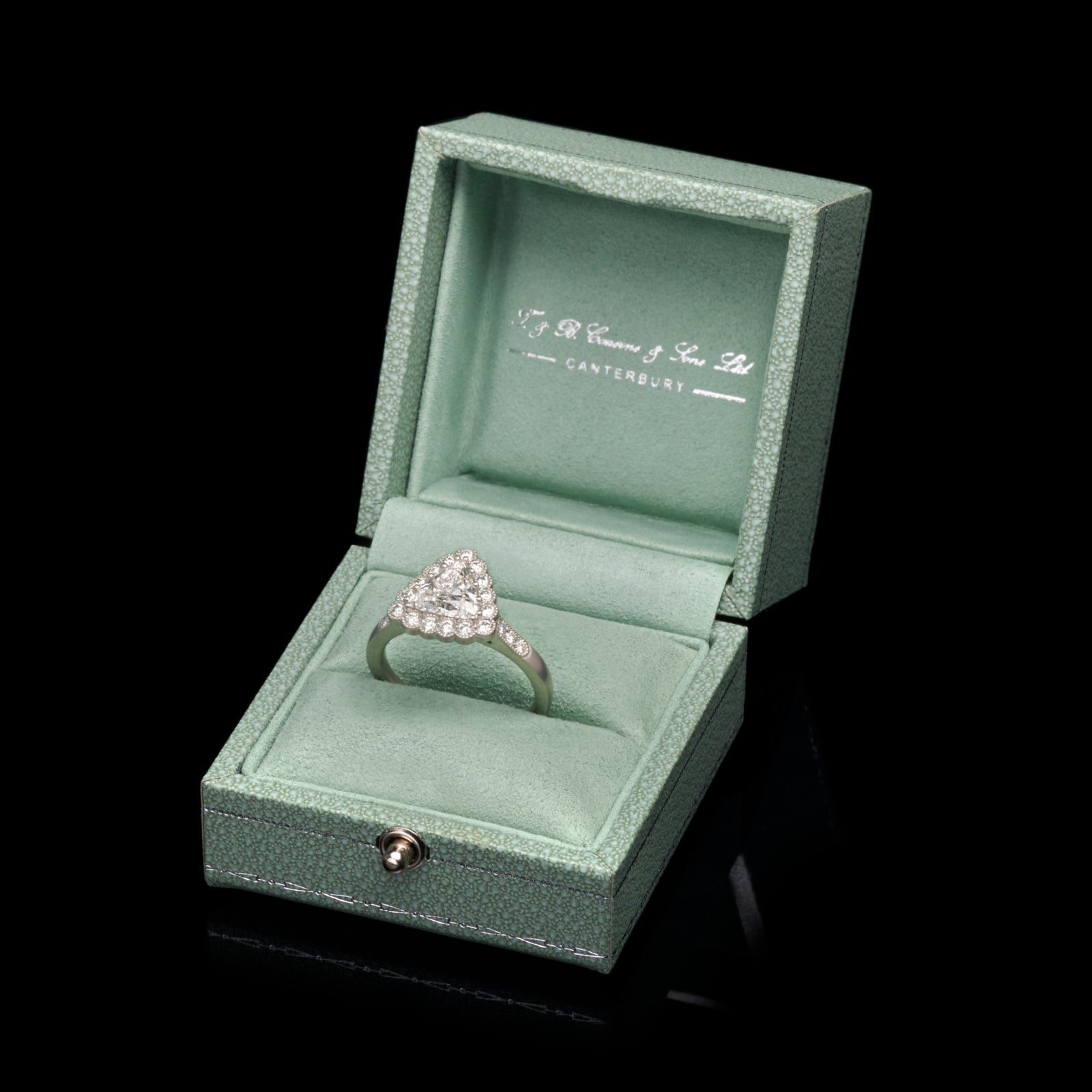 A unique Trilliant cut Diamond cluster ring – Cousins Fine Jewellery