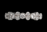 A sparkling 'String of Bubbles' diamond full eternity ring.