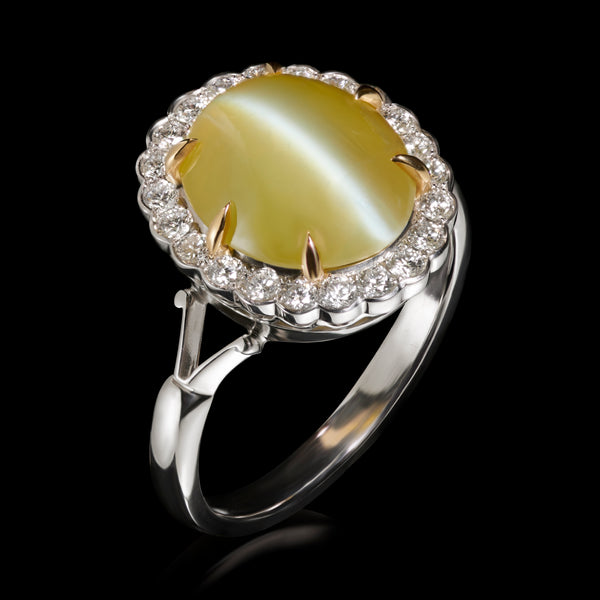A Unique Chrysoberyl Cat's Eye & Diamond Cluster Ring