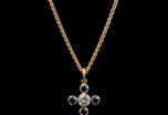 An amazing Sapphire Quatrefoil pendant with bold single stone Diamond centre