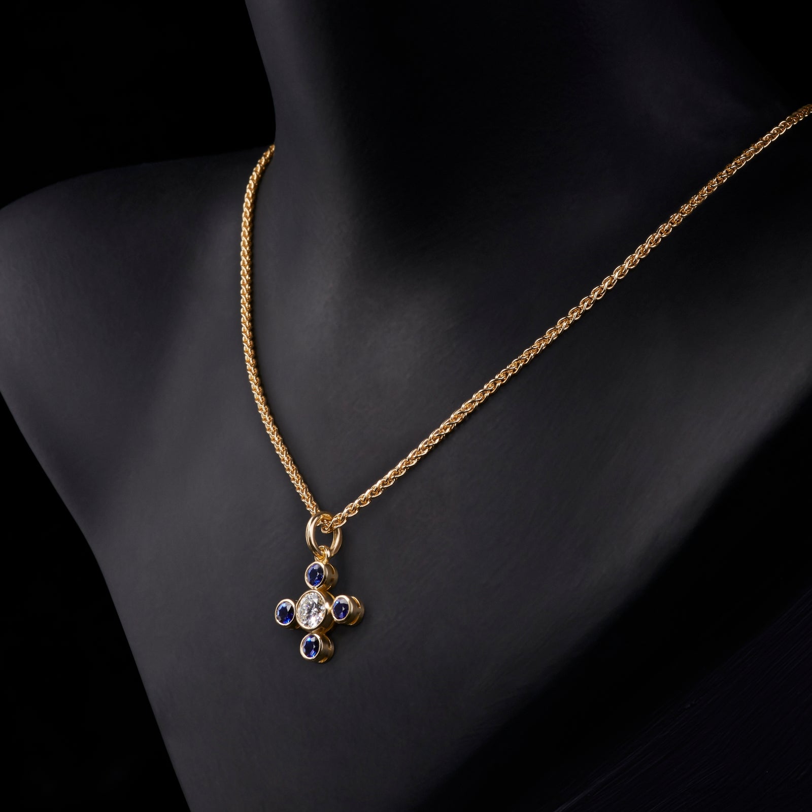 An amazing Sapphire Quatrefoil pendant with bold single stone Diamond centre