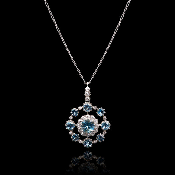 An Antique Aquamarine & Diamond Circlet Cluster Pendant