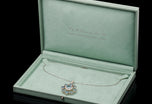 An Antique Aquamarine & Diamond Circlet Cluster Pendant