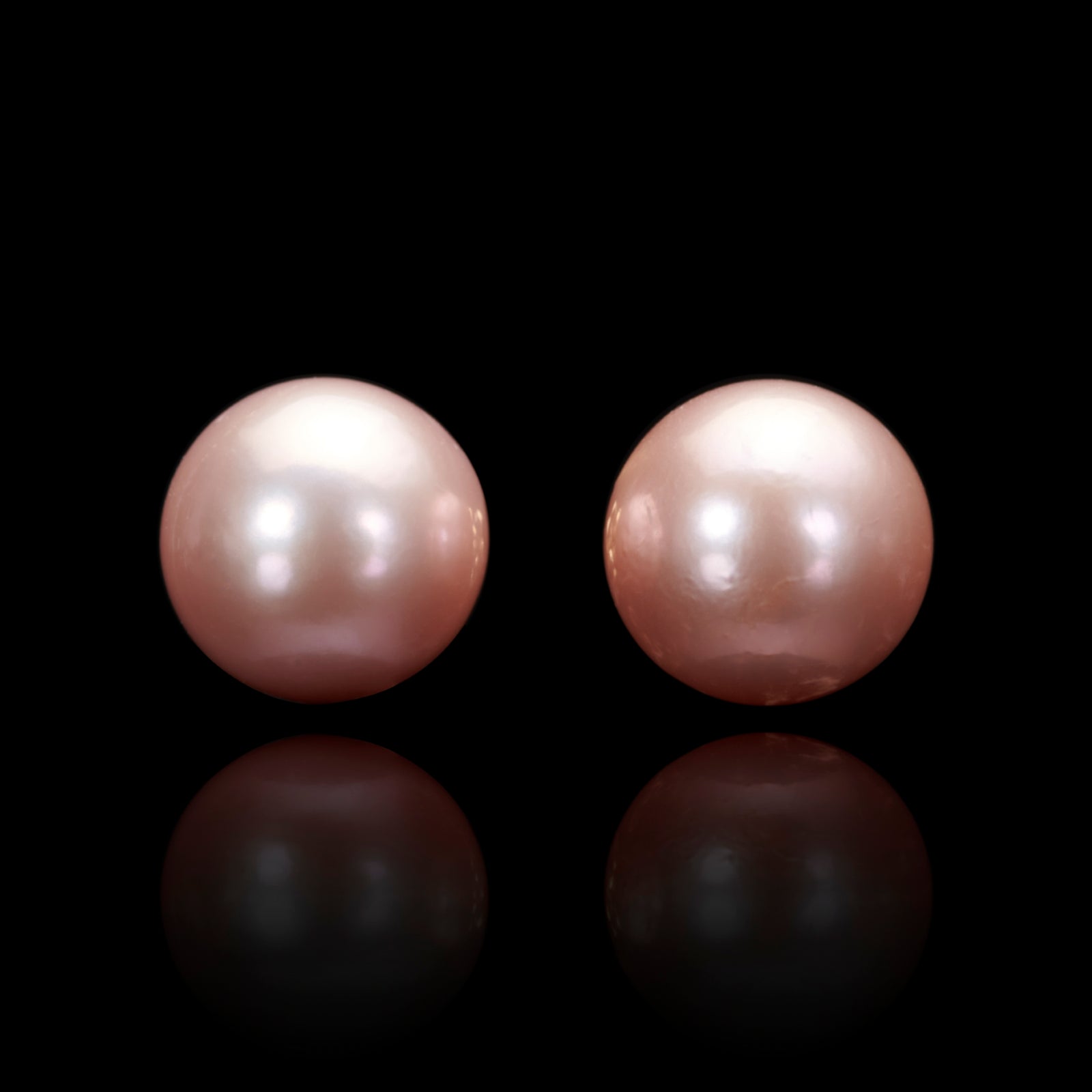 A Beautiful Pair of large Pink Pearl Stud Earrings